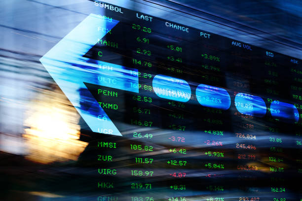 istock Finance. Arrow. Abstract office Buildings and Trading Screen Data. 1344044639