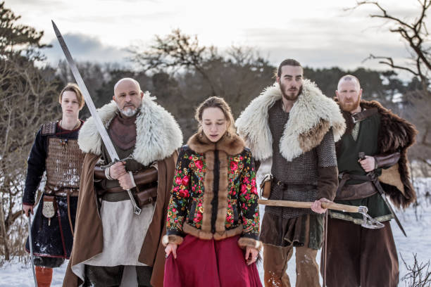 istock Viking warriors in a snow filled forest 1344045288