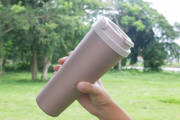 istock Hand on coffee stainles steel thermo cup 1344055509