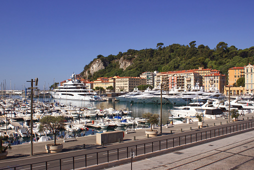 Yachts in bay near houses and hotels, Fontvielle, Monte-Carlo, Monaco, Cote d'Azur, French Riviera.