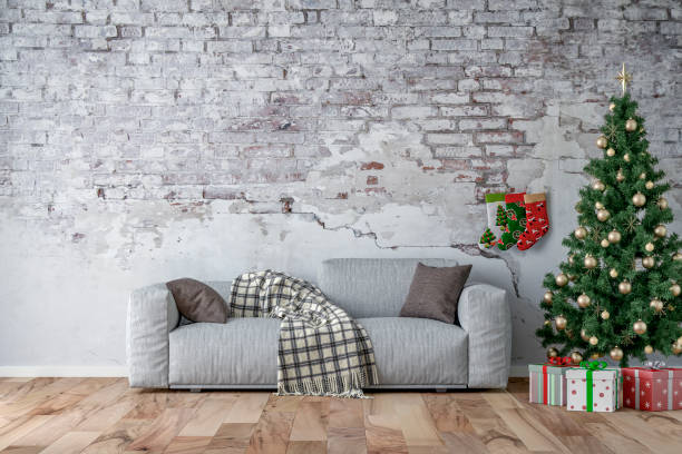 istock Empty simple living room with gray sofa, Christmas tree and gifts 1344058771