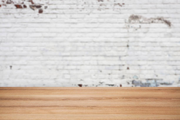 istock Wooden Table with White Wood Background 1344059311