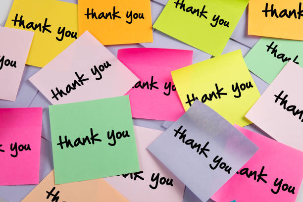 istock Thank You Message on Adhesive Notes on Bulletin Board 1344059999