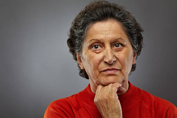 istock Sad senior woman in thoughts 134406893
