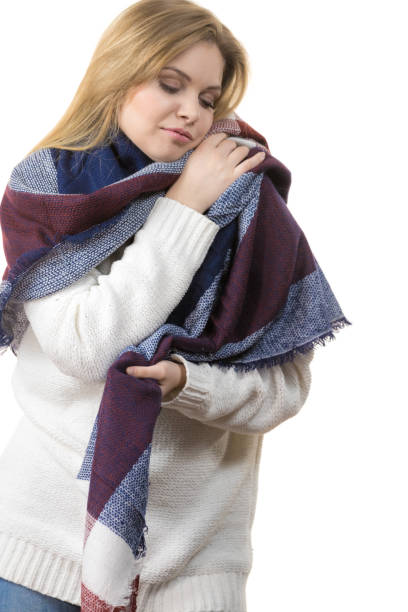 istock Woman wearing warm scarf 1344075589