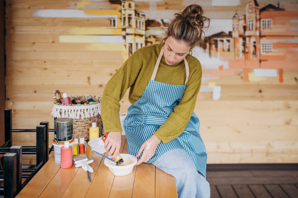 istock Female artist preparing colors 1344075855