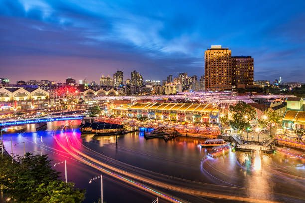 Clarke Quay a Singapore nightlife area Singapore night at Clarke Quay passenger craft photos stock pictures, royalty-free photos & images