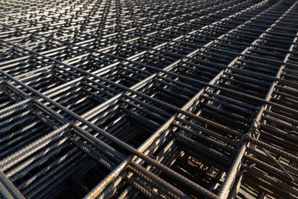 istock The rebar is bonded with steel wire for use as a construction infrastructure. Which part of the rebar has rusted due to chemical reactions. 1344091261