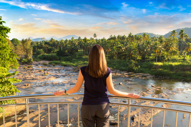 istock Woman on balcony in Sri Lanka 1344091873