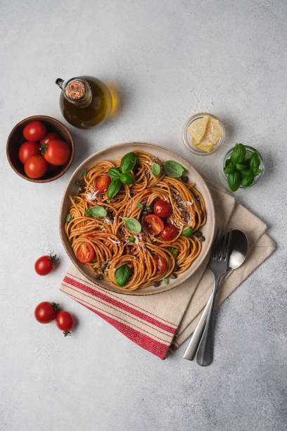 istock Whole wheat pasta with tomato sauce 1344093219