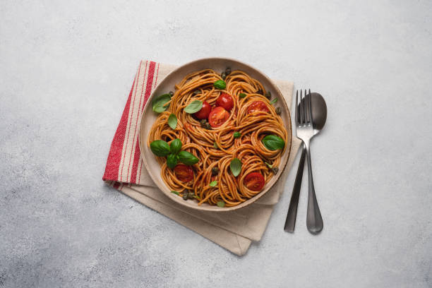 istock Whole wheat pasta with tomato sauce 1344094061