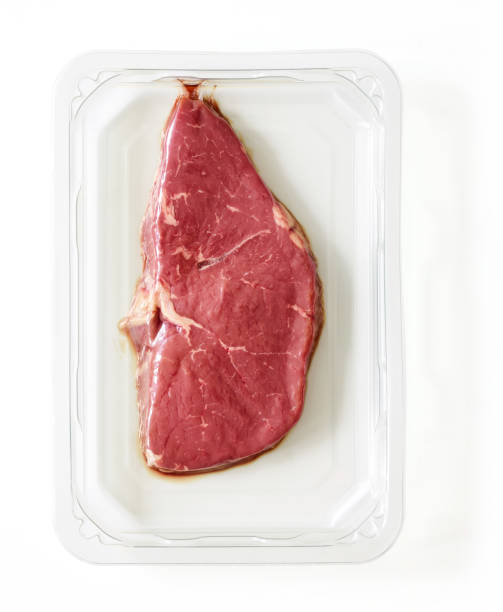 istock Raw steak packed for market isolated on white, from above 1344094197