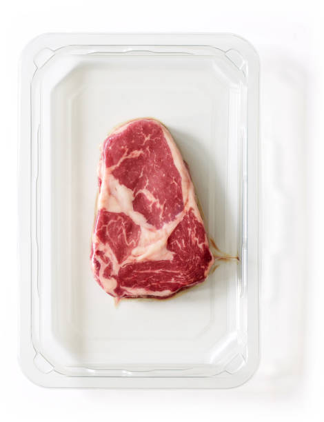 istock Raw steak packed for market isolated on white, from above 1344094199
