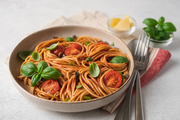 istock Whole wheat pasta with tomato sauce 1344094239