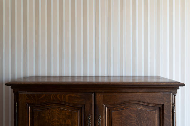 istock vintage drawer cabinet against a wall with stripes 1344094345