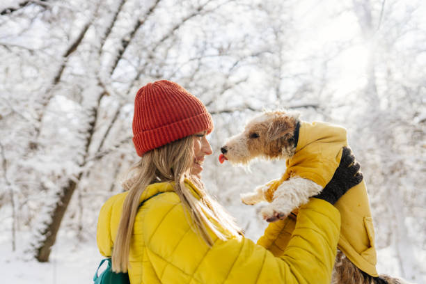 istock Snowy day with my little dog 1344097164