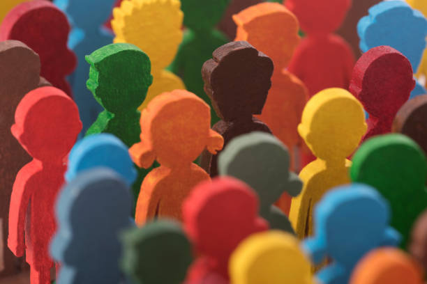 istock Colorful painted group of people figures 1344097972
