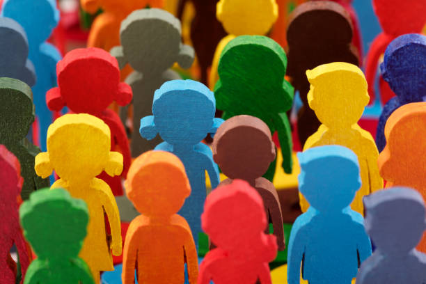 istock Colorful painted group of people figures 1344098001