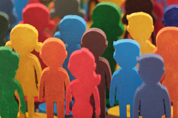 istock Colorful painted group of people figures 1344098031