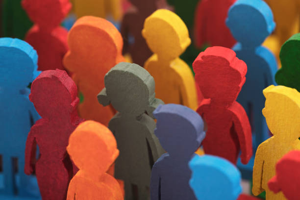 istock Colorful painted group of people figures 1344098128