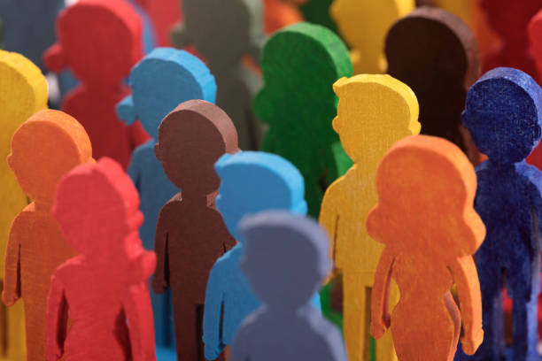 istock Colorful painted group of people figures 1344098131