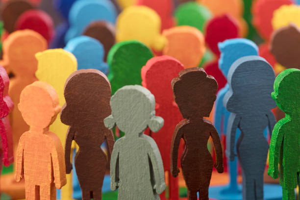 istock Colorful painted group of people figures 1344098218