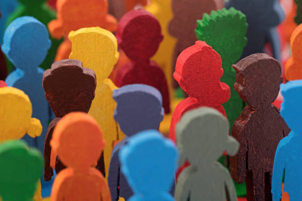 istock Colorful painted group of people figures 1344098309