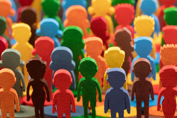 istock Colorful painted group of people figures 1344098362