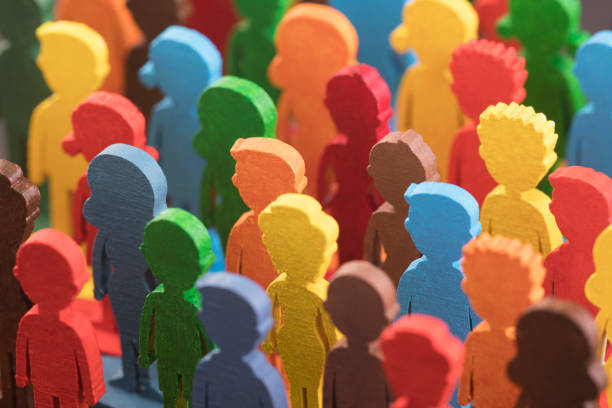 istock Colorful painted group of people figures 1344099001