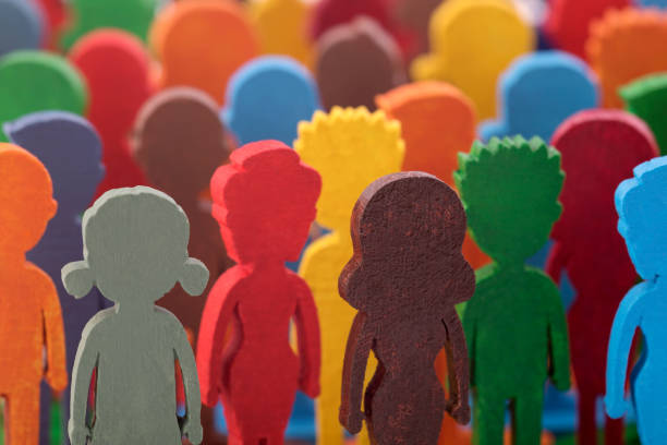 istock Colorful painted group of people figures 1344099365