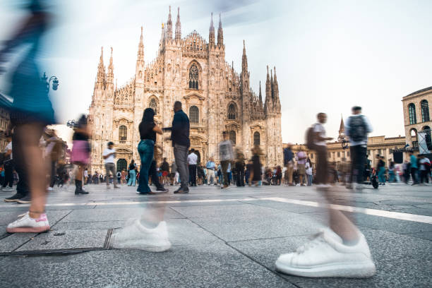 istock Duomo square in Milan crowded at sunset 1344101421