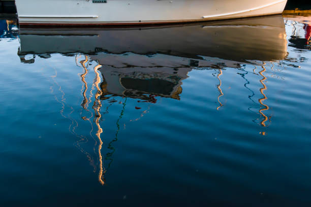 istock Boat Reflecting in the Rippled Water 1344103817