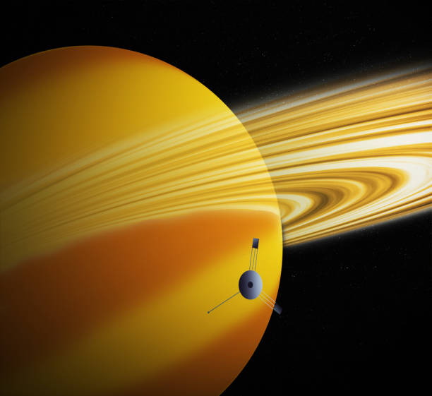 istock 3d illustration of the Voyager space craft flying over Saturn 1344108615