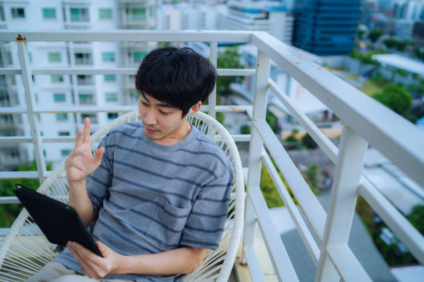 istock Young man social distancing meeting with coworker. 1344108921
