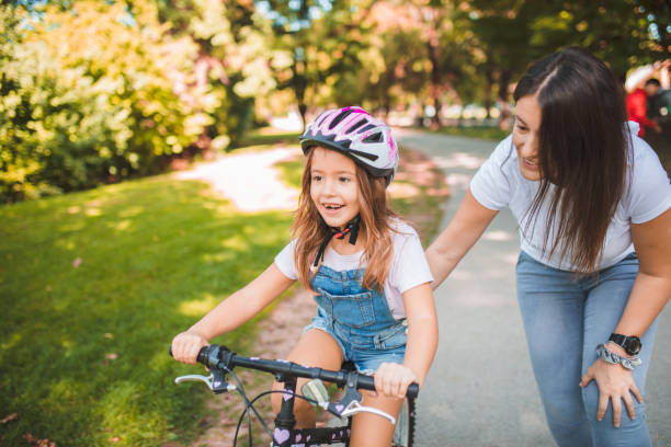 istock Happy child rides a bike 1344109040