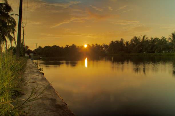 istock Sunset from lake banks 1344116480