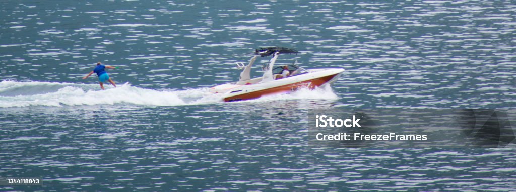 Aerial view of Water Skier from a distance on Lake como, Italy Architecture Stock Photo