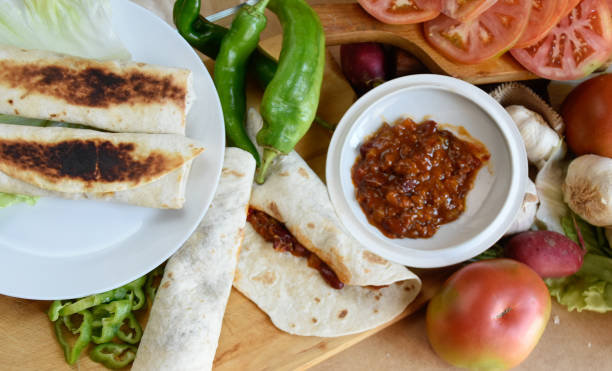istock Mexican beans with meat and corn pancakes 1344118872