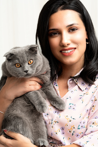 Young Woman with Kitten