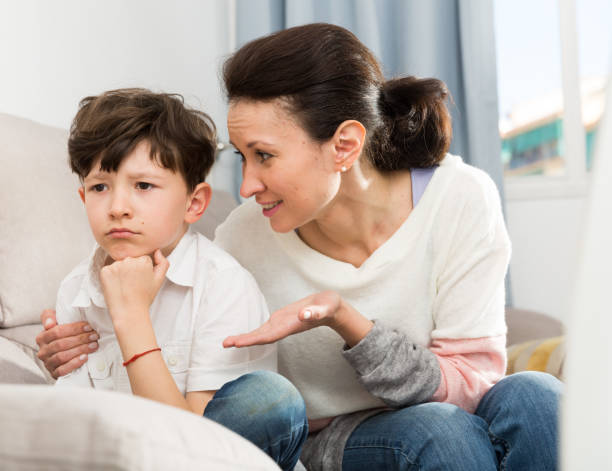istock Mom soothing offended tweenager 1344124392