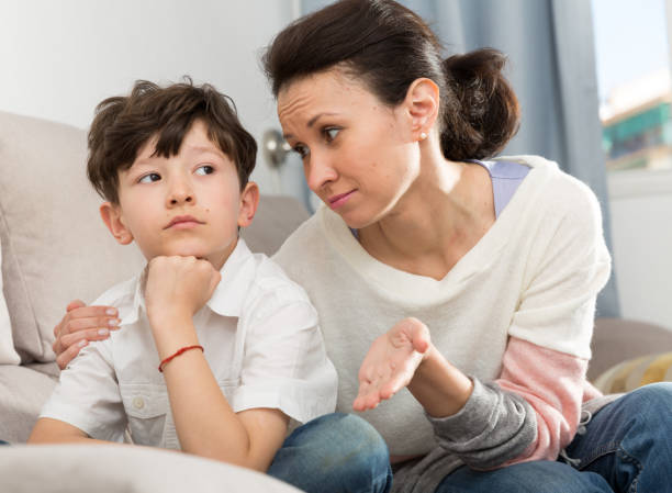 istock Mother consoling sad son 1344124394