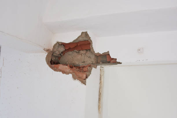 istock Hole in the wall of a house under construction 1344127056