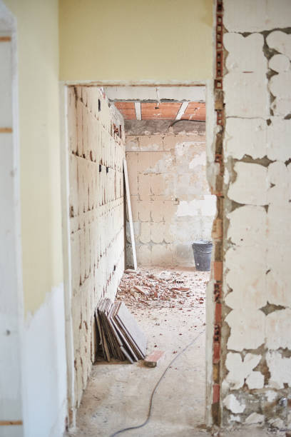 Debris on the ground of a house under construction with natural light