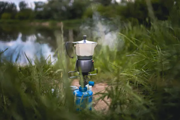 Photo of Making Coffee on Camping Gas in Nature