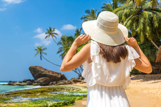 istock Woman on a tropical beach 1344131894