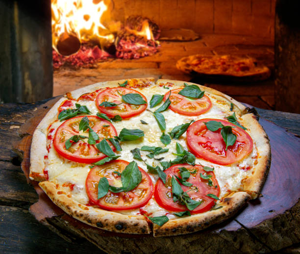 istock Pizza Margherita made with Tomatoes, Mozzarella 1344147630