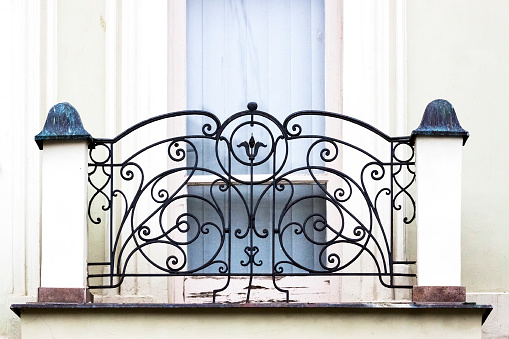 Beautiful old ornamental balcony, background with copy space, horizontal composition
