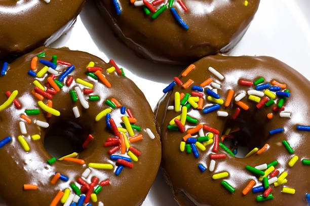 istock Chocolate Donuts with Colorful Rainbow Sprinkles 134415900
