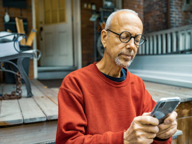 istock Senior man doing carpentry outdoors 1344160781