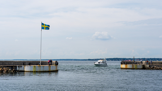 Helsingborg, Sweden - July 19, 2020: Boat entering north harbour in Helsingborg, Sweden